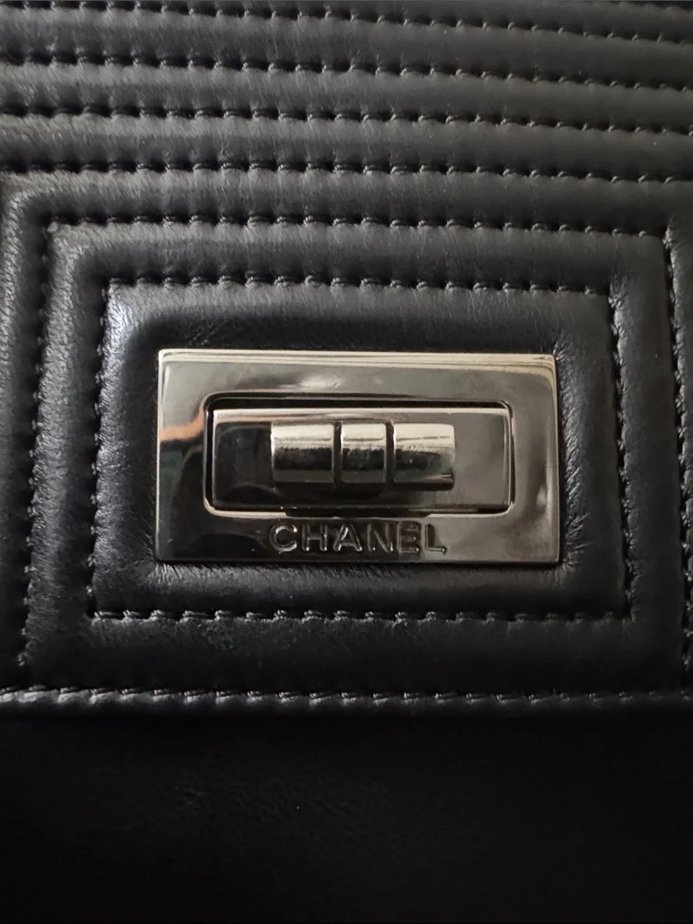 CHANEL Black Leather Wristlet Clutch with Quilted Flap and Silver Turn Locks